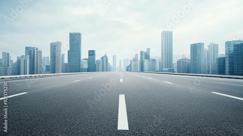 Empty Urban Roadway with City Skyline