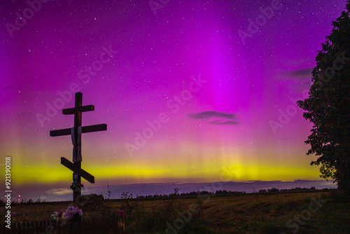 Obraz na płótnie night starry sky outside the city with purple reflections of the northern lights w salonie