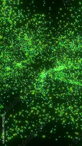 Vibrant green light particles swirling in mesmerizing patterns at a cosmic-themed event