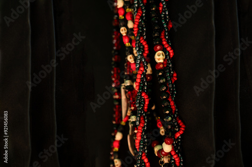 black and red guide cord with skulls, umbanda, a Brazilian religion of African origin