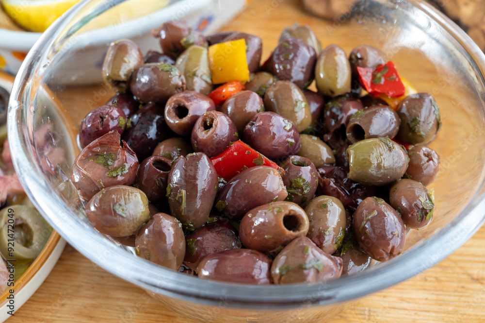 Pickled and marinated olives Ligurian style, tasty Italian starters, antipasti, tapas Pickled and marinated olives Ligurian style, tasty Italian starters, antipasti, tapas