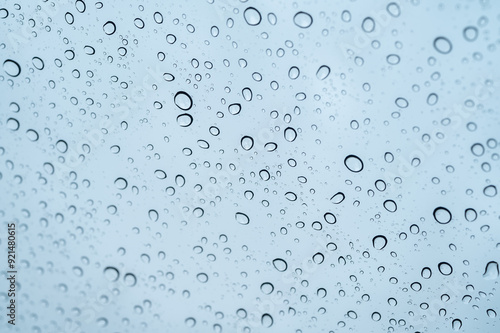 Dew drop on the glass window background. Dew is the moisture that forms as a result of condensation.