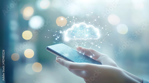 hand holding smartphone with cloud of digital connections and data