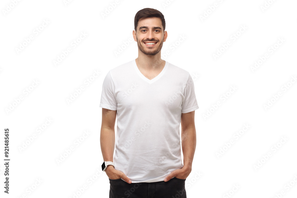 Fototapeta premium Mockup of young man standing with hands in pockets, wearing blank white t-shirt with copy space