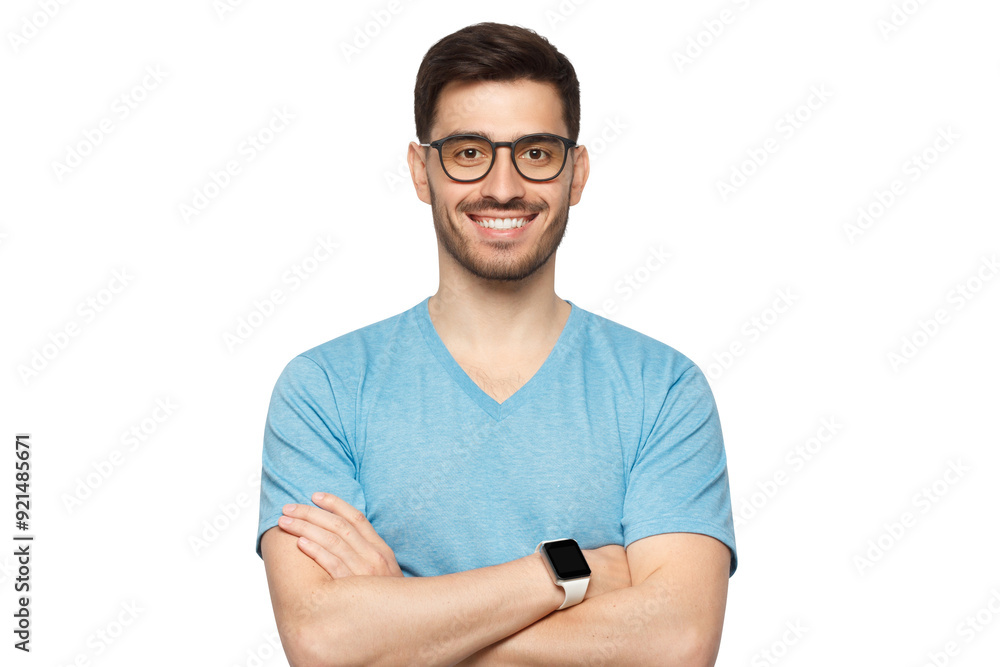 Portrait of confident young man standing with crossed arms, wearing glasses, dressed in casual blue t-shirt Portrait of confident young man standing with crossed arms, wearing glasses, dressed in casual blue t-shirt