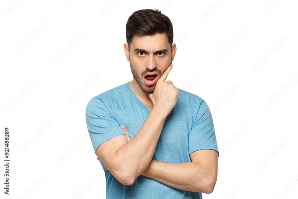 Young man with shocked face, displeased with news Young man with shocked face, displeased with news