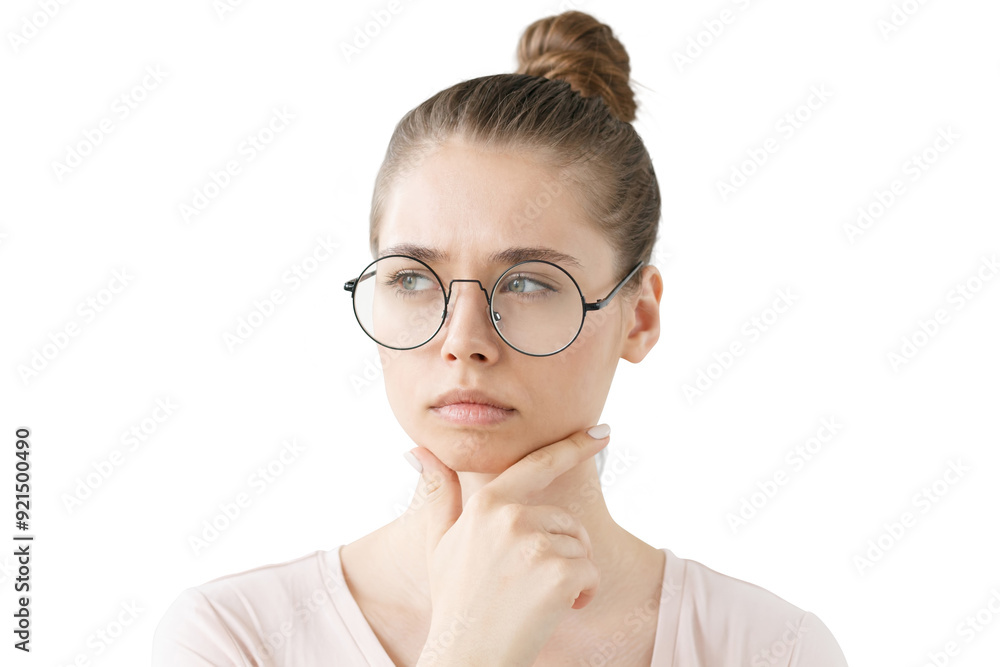 Thoughtful woman with hand on chin, looking away with a contemplative, focused expression Thoughtful woman with hand on chin, looking away with a contemplative, focused expression