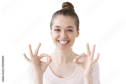 Happy girl doing okay gesture with both hands