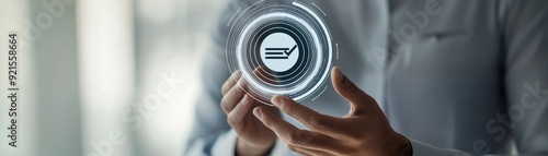 A person holds a futuristic interface with a checkmark symbol, symbolizing approval and technology integration.