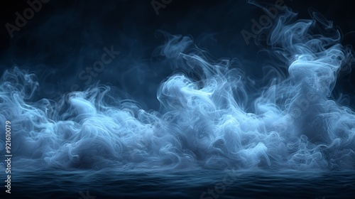 Swirling blue smoke rising against a dark backdrop, creating an ethereal atmosphere in low light