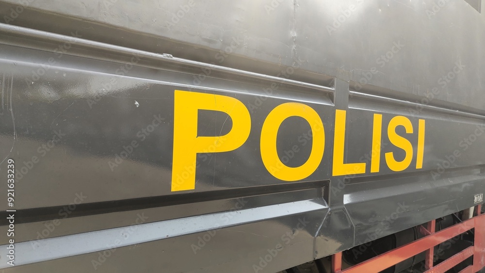 A close-up view of a vehicle with the word A close-up view of a vehicle with the word
