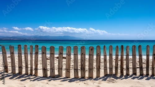 An old wooden fence overlooking Punta Paloma Beach in Tarifa, Spain.