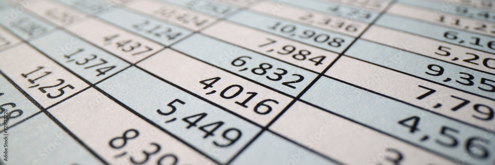Investigation papers with columns of digits on table Investigation papers with columns of digits on table