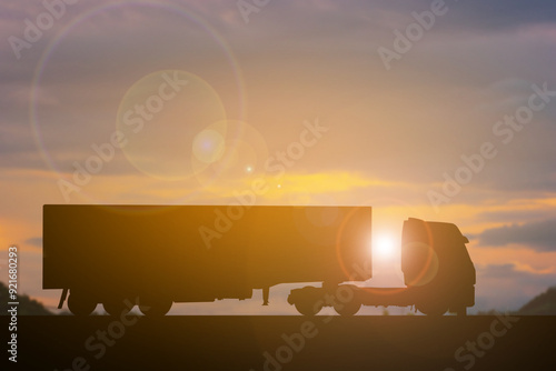Silhouette truck long vehicle transportation sunset background
