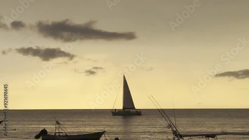 sailboat at sunset photo