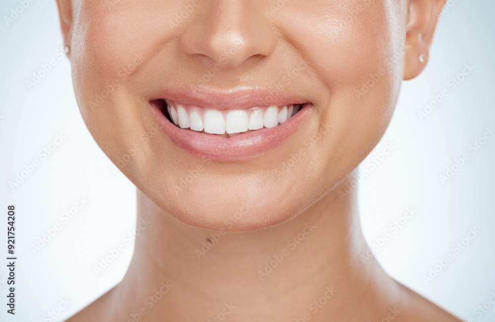 Obraz premium Woman, mouth and smile in studio for dental care with hygiene and teeth whitening for gum health. Female person, happy and satisfied with oral treatment or canal procedure on white background