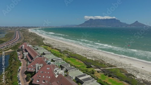 Drone shot of the beautiful kitesurf spot Dolphins beach with view of Table Mountain.