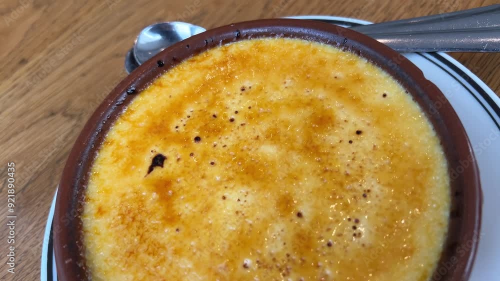 Creme brulee, dessert in an oriental cafe. White crockery. Creme Brulee Creme brulee, dessert in an oriental cafe. White crockery. Creme Brulee