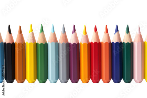 A Vibrant Array of Colored Pencils Displayed Artistically on a White Surface on White or PNG Transparent Background.