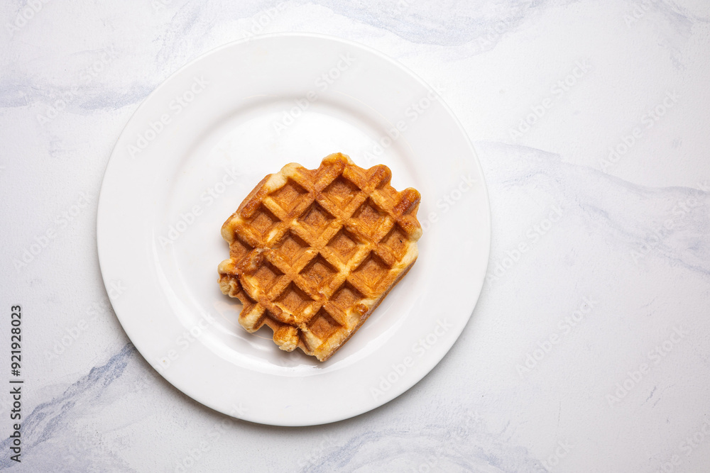 Belgian waffles on white plate Belgian waffles on white plate