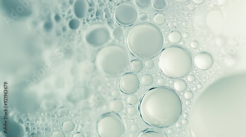Close-up of abstract bubbles in a light greenish hue.