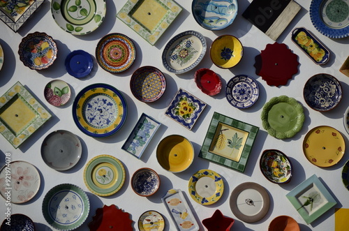Coloured ceramic plates on the facade of a house