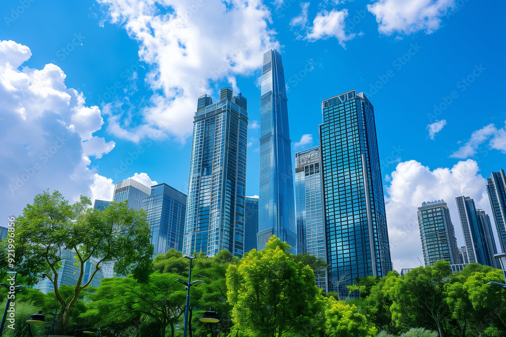 Skyscrapers Viewed from Below with Blue Sky and White Clouds Skyscrapers Viewed from Below with Blue Sky and White Clouds