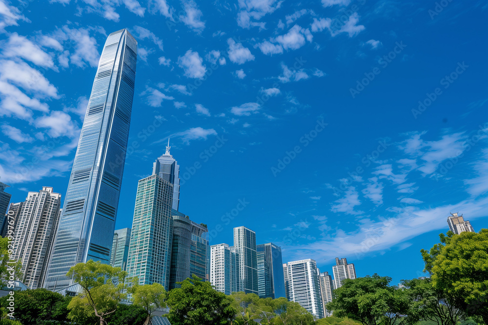 Skyscrapers Viewed from Below with Blue Sky and White Clouds Skyscrapers Viewed from Below with Blue Sky and White Clouds