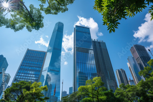Skyscrapers Viewed from Below with Blue Sky and White Clouds