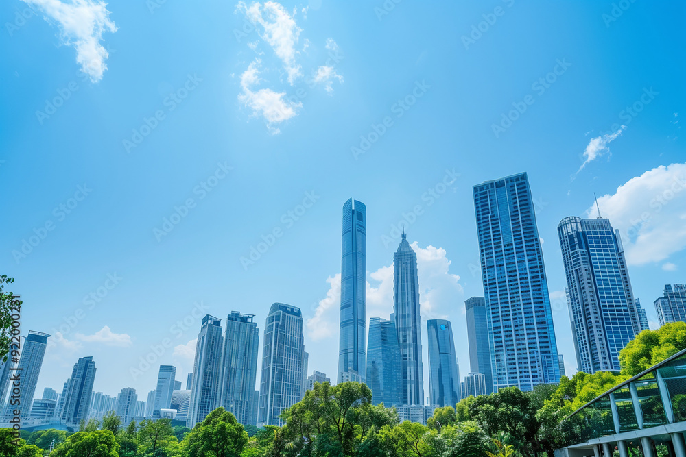 Skyscrapers Viewed from Below with Blue Sky and White Clouds Skyscrapers Viewed from Below with Blue Sky and White Clouds
