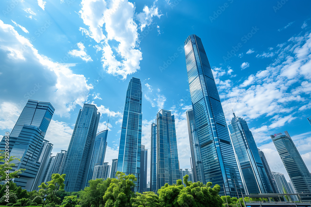 Skyscrapers Viewed from Below with Blue Sky and White Clouds Skyscrapers Viewed from Below with Blue Sky and White Clouds
