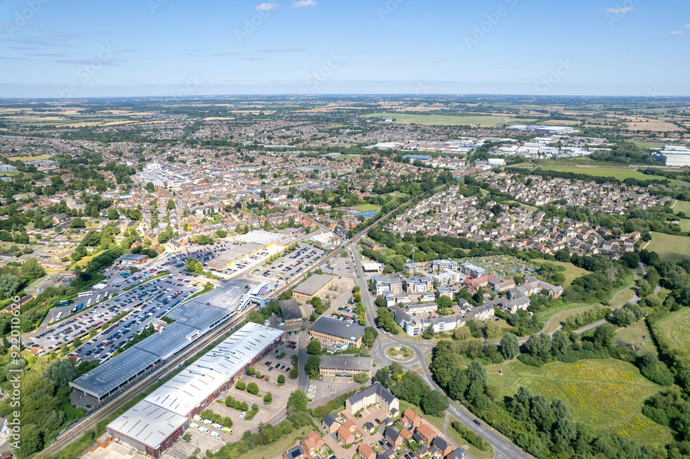 Bicester Village and Bicester town center, amazing aerial view in summer daytime, uk Bicester Village and Bicester town center, amazing aerial view in summer daytime, uk