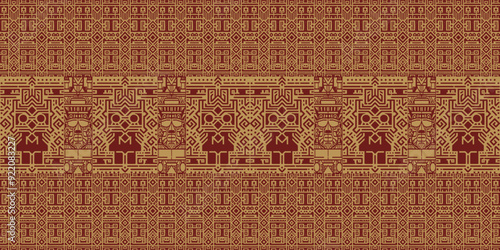 Intricate Aztec-inspired pattern with geometric shapes and stylized masks. Gold and maroon design on brown background. Ethnic, repeating motif.