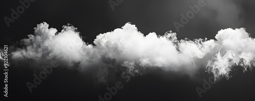 A Swirling Cloud Formation Against a Dark Sky photo