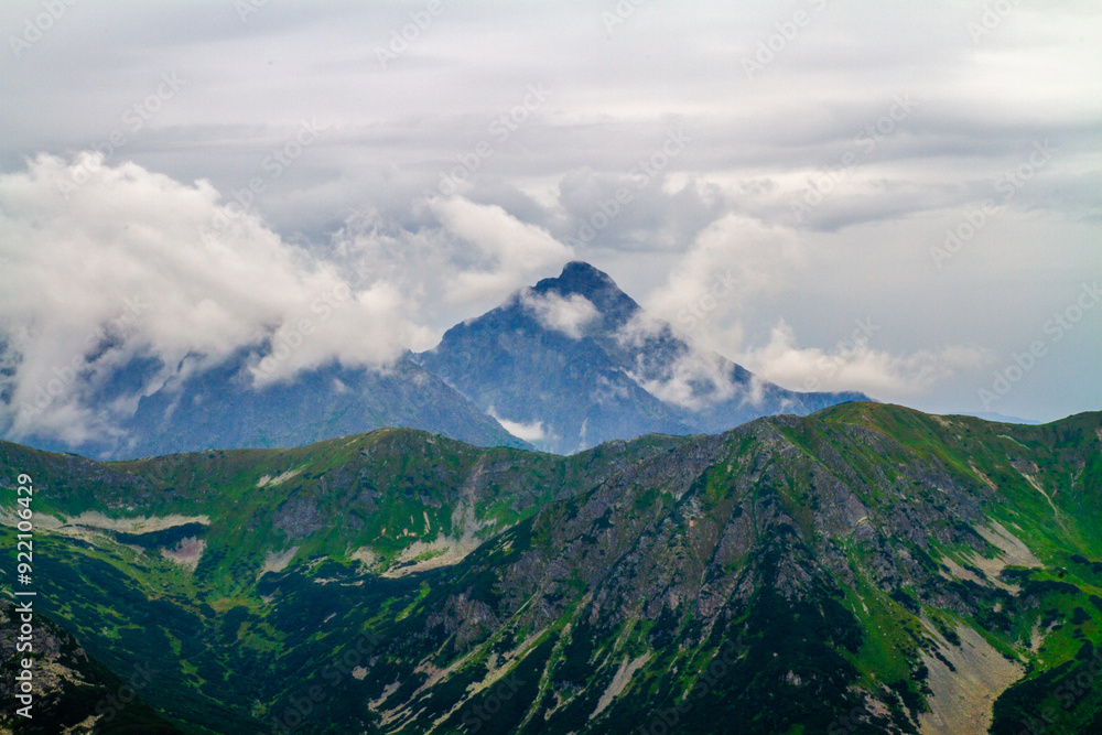 Beautiful mountain landscape with clouds and fog. Beautiful mountain landscape with clouds and fog.