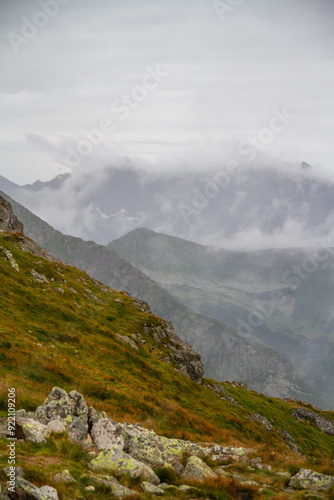 Beautiful mountain landscape with clouds and fog. 
