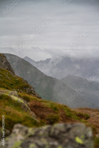 Beautiful mountain landscape with clouds and fog. 
