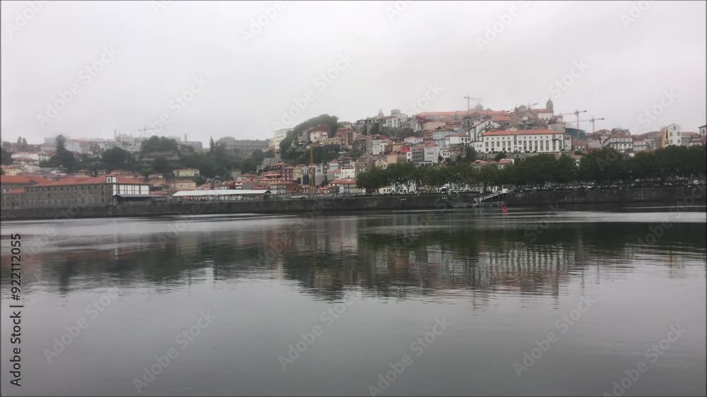 Panoramic view of downtown Porto in Portugal, riverside area with morning fog Panoramic view of downtown Porto in Portugal, riverside area with morning fog