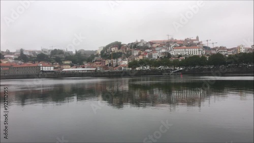 Panoramic view of downtown Porto in Portugal, riverside area with morning fog