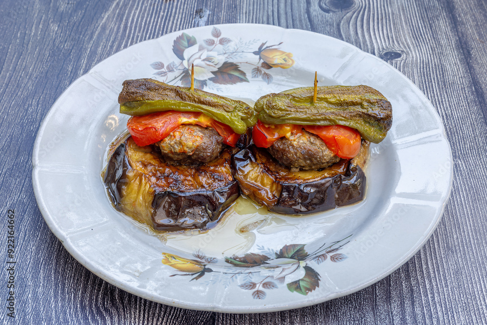 Traditional delicious Turkish food; Kofte kebab wrapped in eggplant (Turkish name; Islim - islim kebabi or kurdan kebabi)