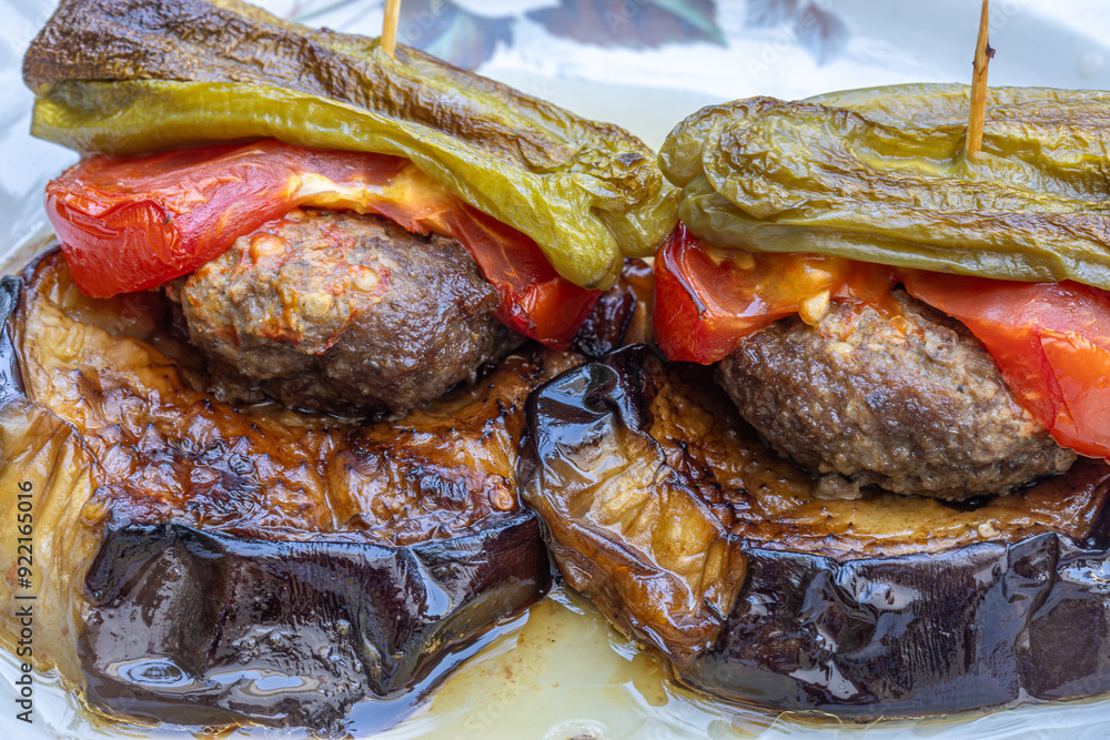 Traditional delicious Turkish food; Kofte kebab wrapped in eggplant (Turkish name; Islim - islim kebabi or kurdan kebabi)