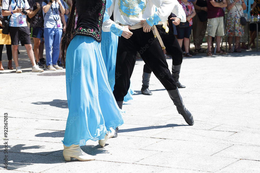 Dancers dancing and wearing one of the traditional folk costume from Republic of Kazakhstan Dancers dancing and wearing one of the traditional folk costume from Republic of Kazakhstan