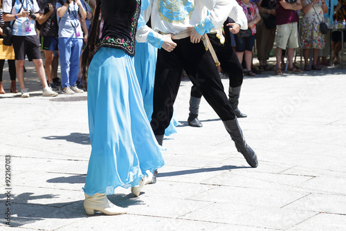 Dancers dancing and wearing one of the traditional folk costume from Republic of Kazakhstan