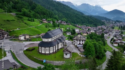 Aerial view above Val di Tires, with the Catinaccio - Torri del Vajolet Rosengarten in the background, South Tyrol, Italy
