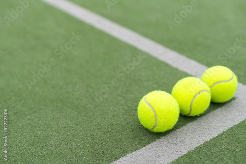 Tennis ball on green grass