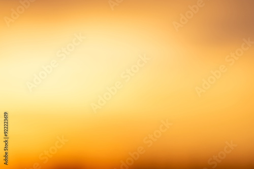 Beautiful luxury soft gradient with orange gold clouds and sunlight on the blue sky perfect for the background, take in everning,morning,Twilight, high