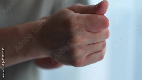 man applies the cream and softly smears it on his hands