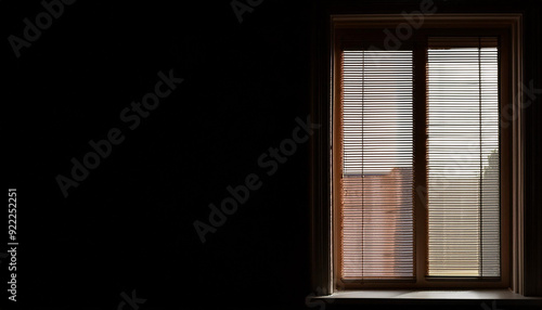 A Window With Blinds in the Dark and Copy Space