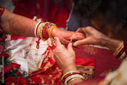 Bengali bride doing wedding rituals 