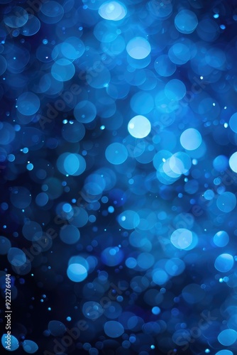 Abstract blue blurry unfocused sparkle glitter blue bokeh background wallpaper with copy space. Blue Christmas glitter design background.